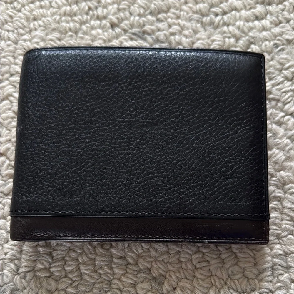 Tumi Black Leather Double Billfold Wallet with Coin Holder.